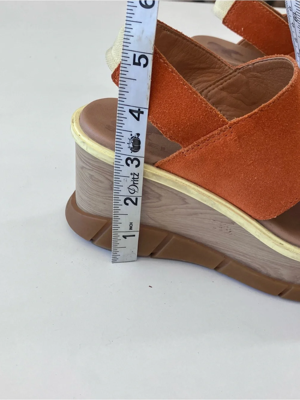 Sorel women’s us size 5.5 orange and tan platform shoes with faux wooden heel